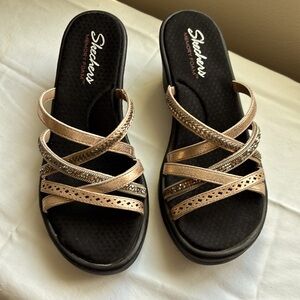 Skechers memory foam sandals. Wedge is 3 inches high size 8 only worn one time.